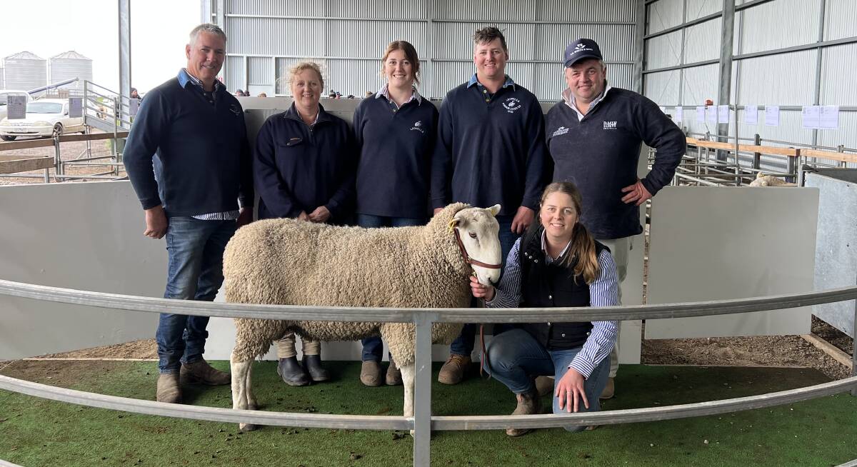 Noel, Stella, Megan, Jack and Emma (kneeling) Lubcke, Leonella, with Marty Gleeson, TB White & Sons, and the top-priced ram.