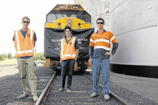 Rainbow GrainCorp staff Shaun Roberts, Josh Heinrich and Shannon Speakman helped load the first grain train to leave from Rainbow in more than two years.