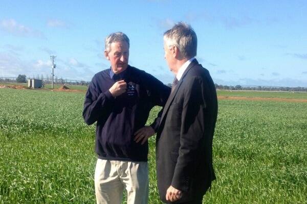 Undera dairy farmer Peter Quinn received funding in round 2 of the funding. He's pictured with Vic Agriculture Minister Peter Walsh, after the launch of the latest funding on his farm recently.
