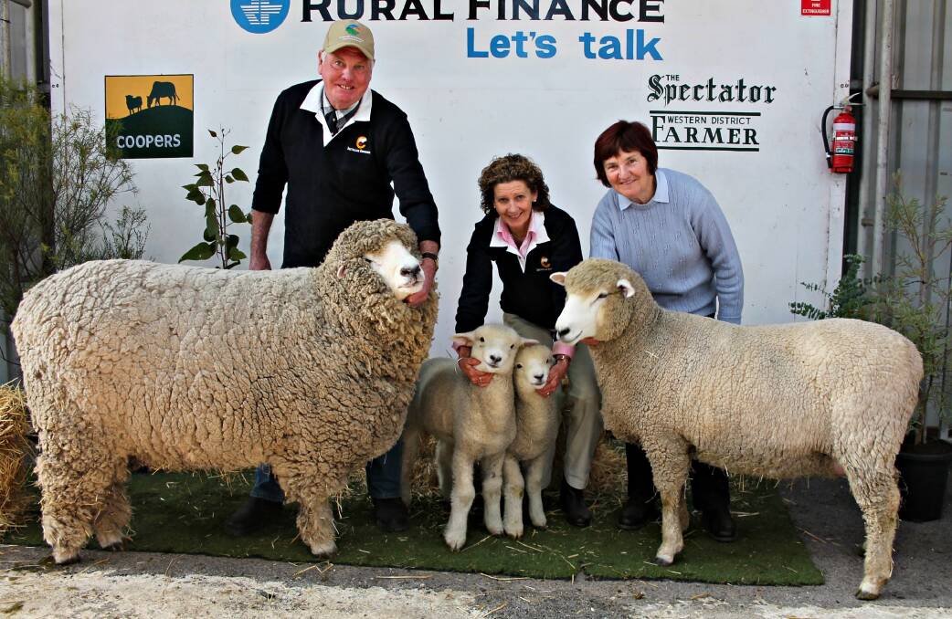 (Right) Stanbury Corriedales co-principal Geoff Risbey; Sweetfield Corriedales principal Bron Ellis; with Sheepvention steward Shirley Foster with the supreme Corriedale ram and ewe.