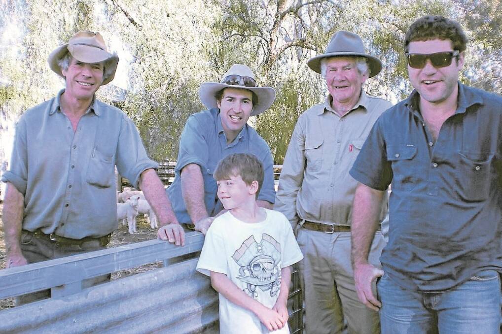 Doug Brown, his sons Paul and Andrew, his father Allan and nephew Mark (front) get ready for shearing. 