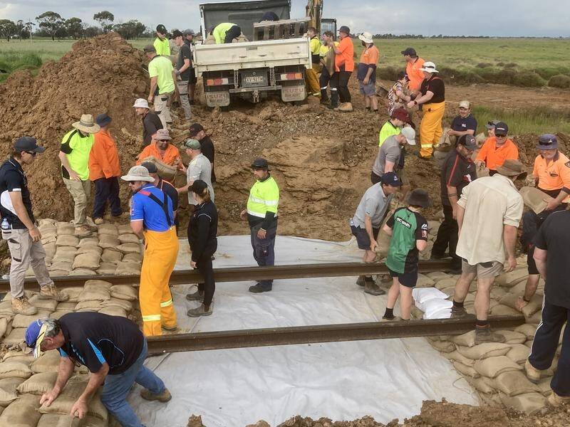 Kerang locals sandbag the railway line to Swan Hill as the Lodden River is due to peak this weekend. (PR HANDOUT IMAGE PHOTO)