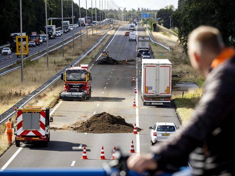 CONCERN: Dutch farmers' activists have dumped manure in protest at the government's nitrogen policy. Photo by EPA.
