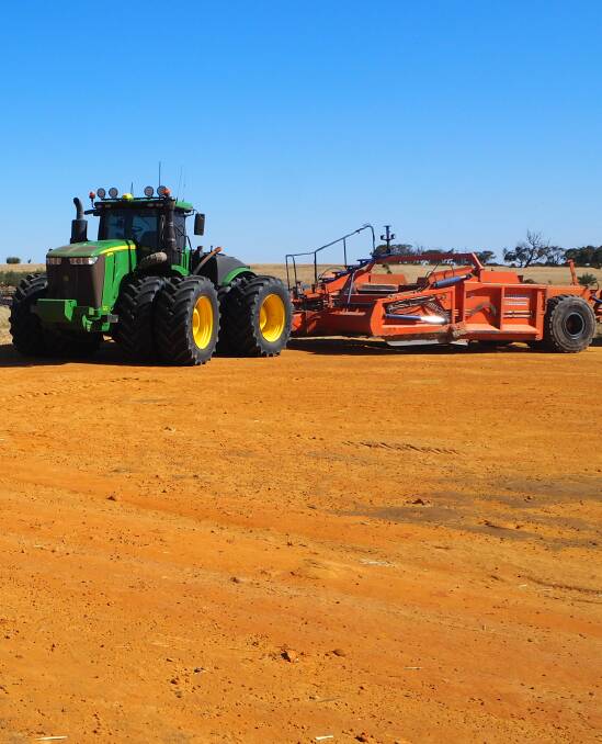 POWERING ON: The Bedford family uses this 620-horsepower tractor to drag clay through their sandy soil. This has made their soil much more fertile.
