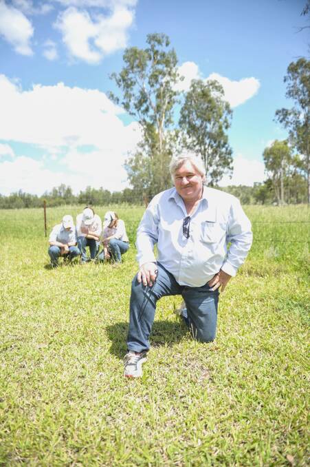 Geoff Maynard, Mt Eugene, Jambin, inspects an area of his property affected by pasture dieback. Photo - Kelly Butterworth.