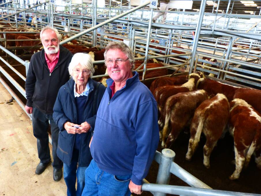 FAMILY OFFERING: Chris (left), Betty and Ken Hayward, who trade as J Hayward & Partners, Ensay, sold 73 Hereford steers from $830-$1110 at Bairnsdale last Friday.