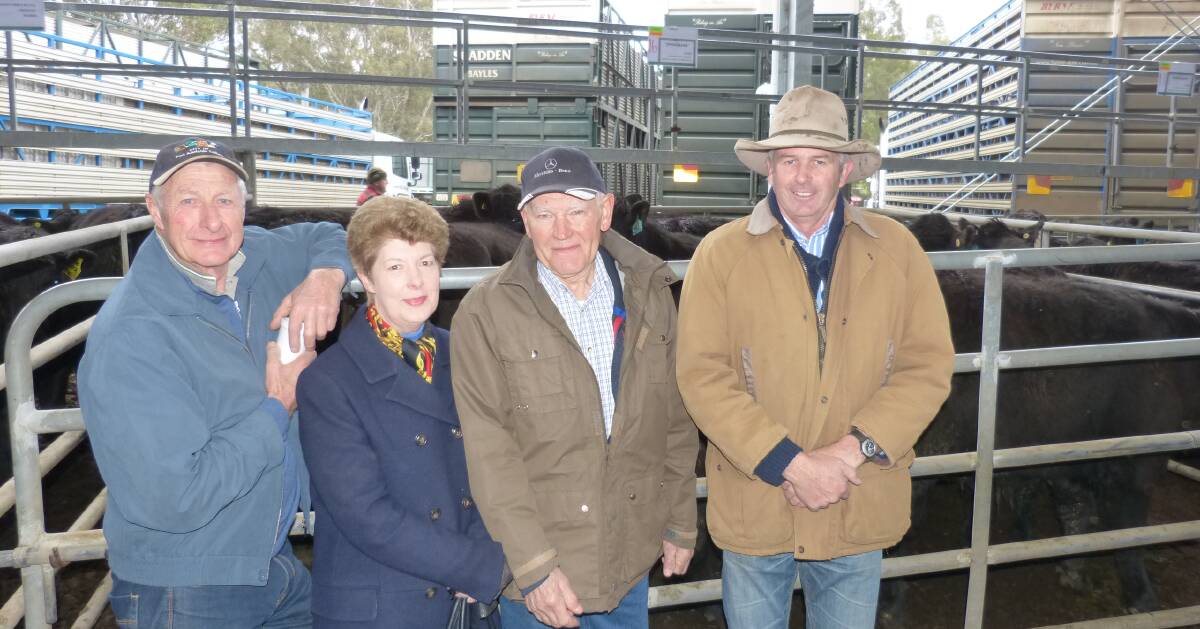 Con & Maree De Groot, "Springbank", Narbethong (centre), with Phil Douglas, Charles Stewart Dove, Colac, and their neighbour, Brian Worcester. The DeGroot's sold 27 Angus steers, Yancowinna blood, from $1490-$1600 at Yea, Friday.