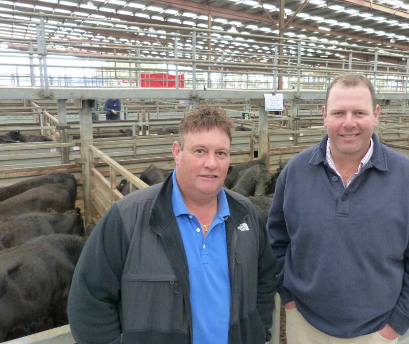 John Bergamin, Bergamin Pastoral Co, Willow Grove, and manager Ben Cumming, at Pakenham last Thursday to follow their 75 Angus steers sell to $1105.