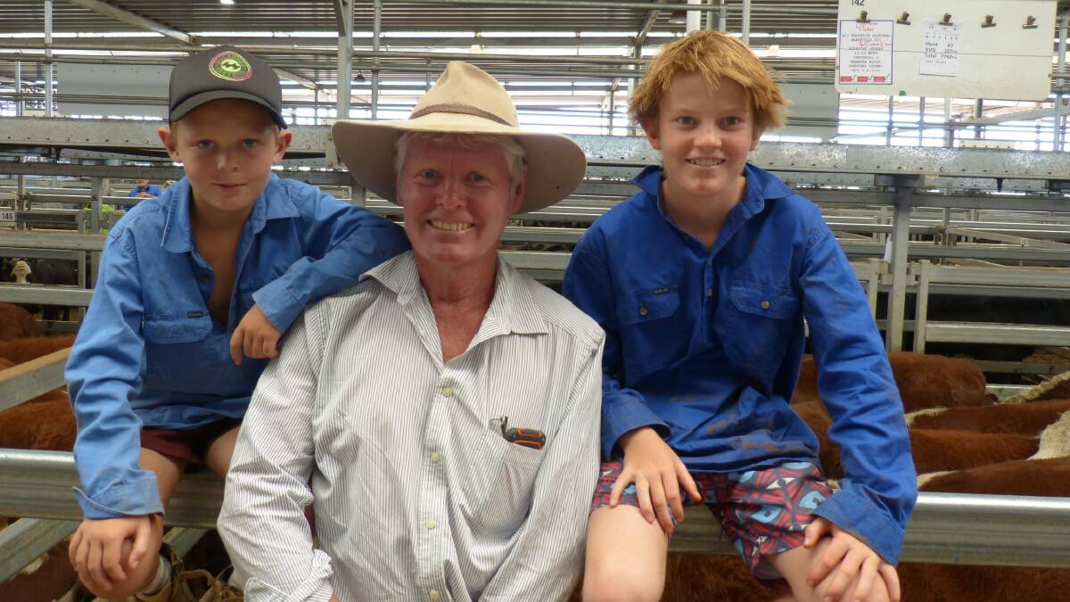 Tony Reardon, Brooklyn Pastoral Co, Mansfield, sons Ben (left), and Tom, at Wodonga's Barnawartha store cattle sale. Tony sold his annual drop of 110 Hereford steers.