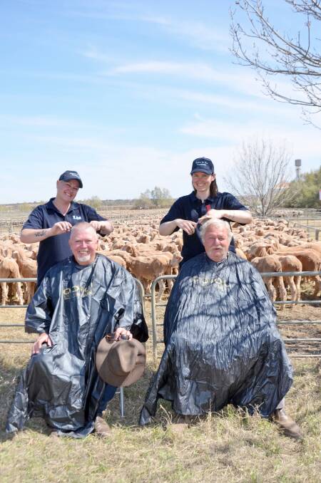 Hairdressers Elizabeth Inguanez and Kathryn Brown, Bacchus Marsh, work their magic on Steve Cooper, Wentworth, NSW, and Trevor Biggs, Werrimull, at the Yelta sheep sale.