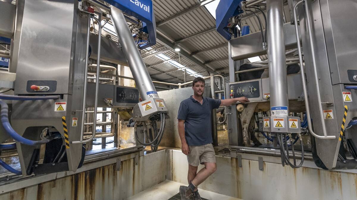FIELD DAY: Farmer Nick Dornauf in the robotic dairy, which he showcased as part of Day in the Dairy. Photos by Craig George.