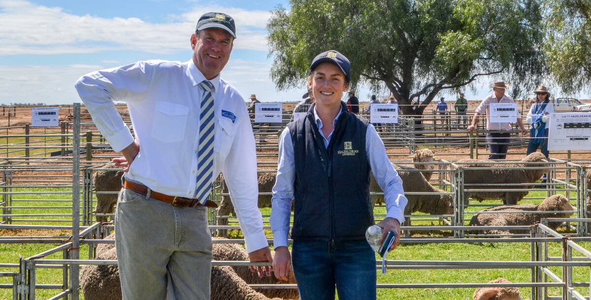 Guest auctioneer Paul Dooley, Tamworth with Bea Litchfield, Hazeldean, Cooma at the conclusion of the ram sale at Hazeldean Riverina depot at Rosevale, Hay.
