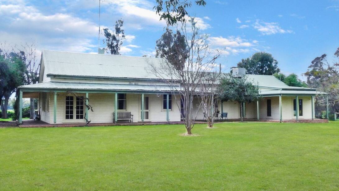 The property features a charming, refurbished 100 year old five bedroom homestead set in established gardens. 