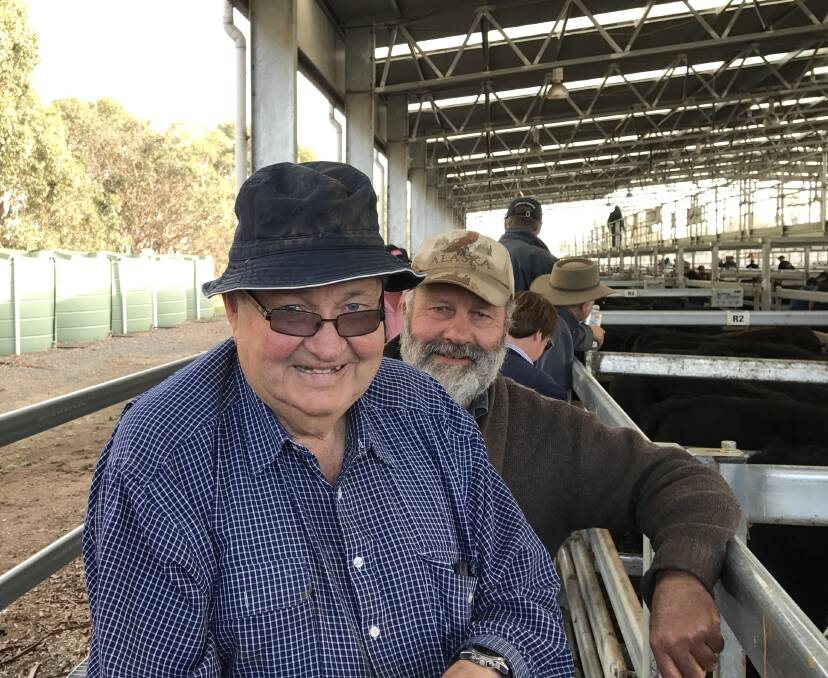 Major buyer Norm Young from Lileah in the far Northwest chats with Geoff Heazlewood from Latrobe at Roberts Limited Powranna Market Complex.