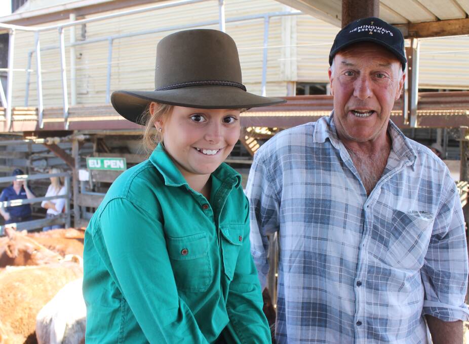 Neil Jenning, Cape Bridgewater, and grand-daughter Kate Rose, from Darwin sold Shorthorn steers in the Hereford-dominated yarding.